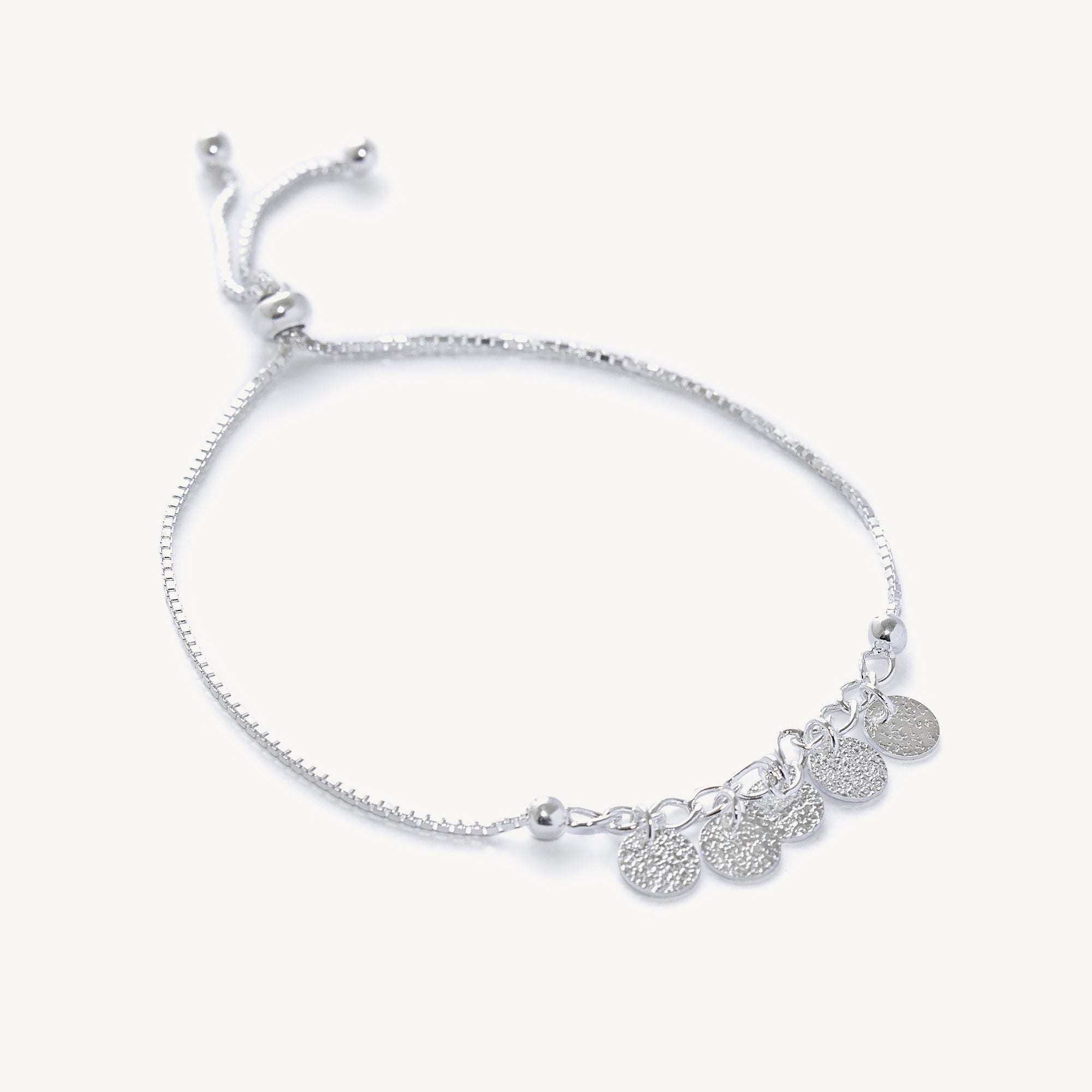 Pulsera plaquitas con bolitas y sistema regulable, ideal para toda ocasión elaborada en plata 925 de AMBAR Joyería Fina