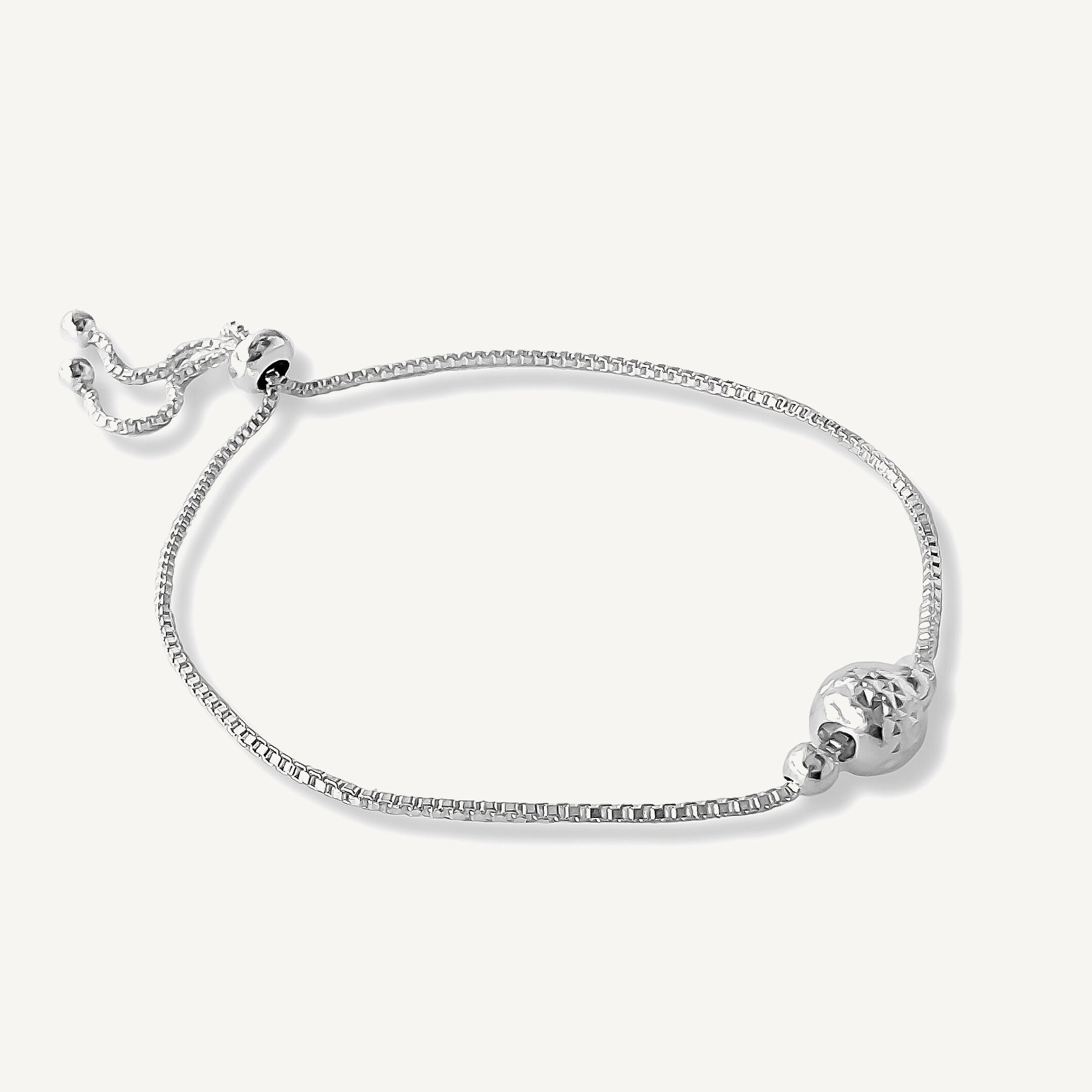 pulsera bolita facetadas con sistema de ajuste regulable elaborada en plata 925 de AMBAR Joyería Fina