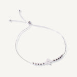 pulsera mariposita plana con bolitas y sistema regulable elaborada en plata 925 de AMBAR Joyería Fina