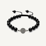 Pulsera San Benito tejida regulable con turmalina negra natural de 8 mm y accesorios de plata 950.