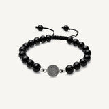 Pulsera San Benito tejida regulable con turmalina negra natural de 8 mm y accesorios de plata 950.