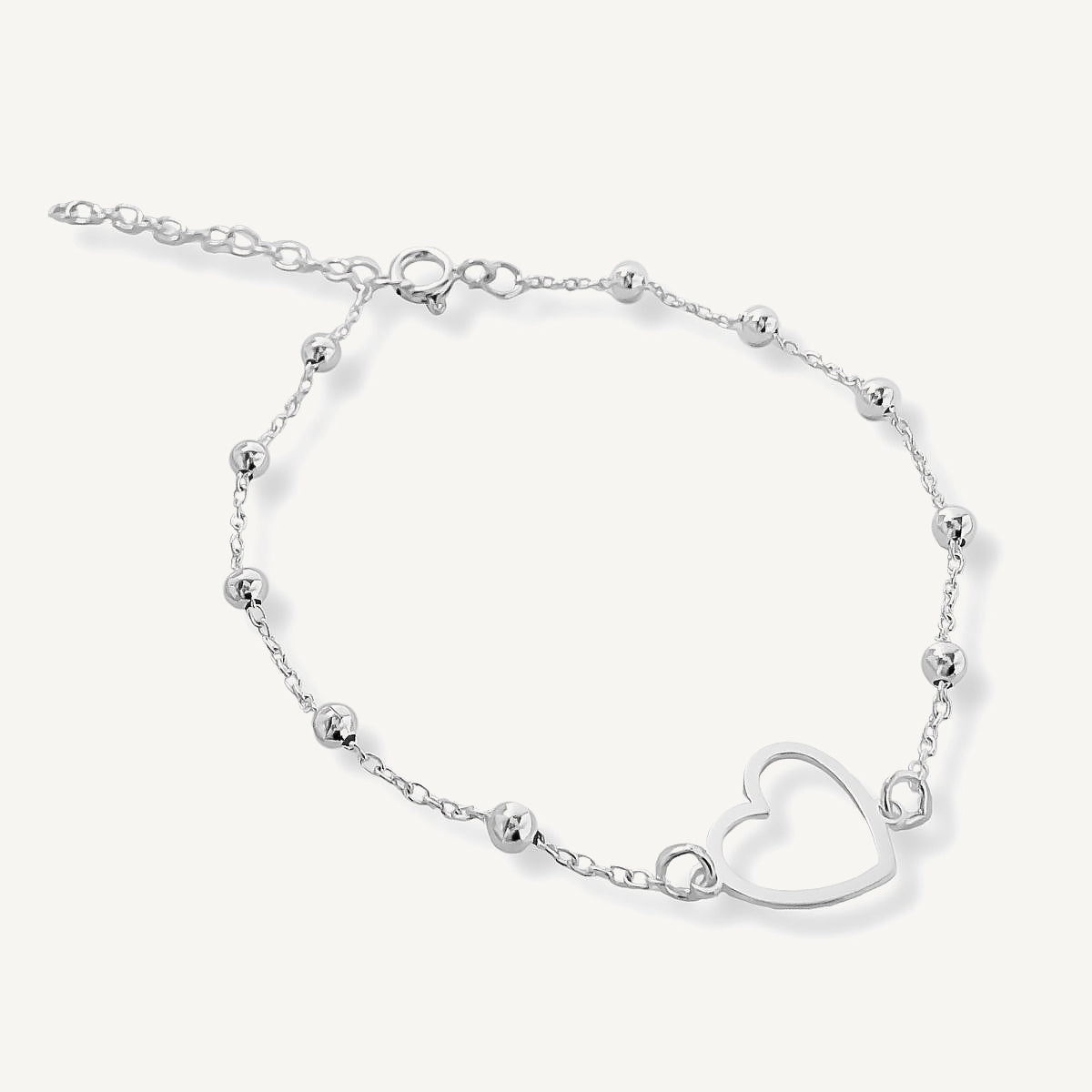 Pulsera Satelite con corazon calado y bolitas elaborado en plata 925 para AMBAR joyería
