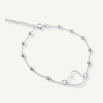 Pulsera Satelite con corazon calado y bolitas elaborado en plata 925 para AMBAR joyería