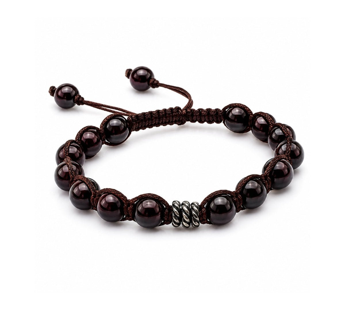 Pulsera tejida para hombre modelo Ares con hilo marrón, esferas de rodonita  y tres aros de plata 925 quemada sobre fondo blanco.