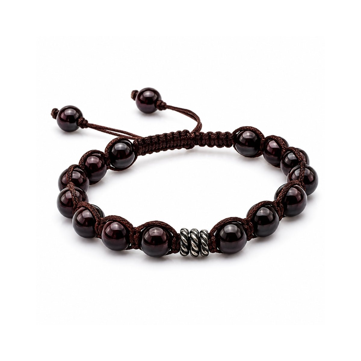 Pulsera tejida para hombre modelo Ares con hilo marrón, esferas de rodonita  y tres aros de plata 925 quemada sobre fondo blanco.