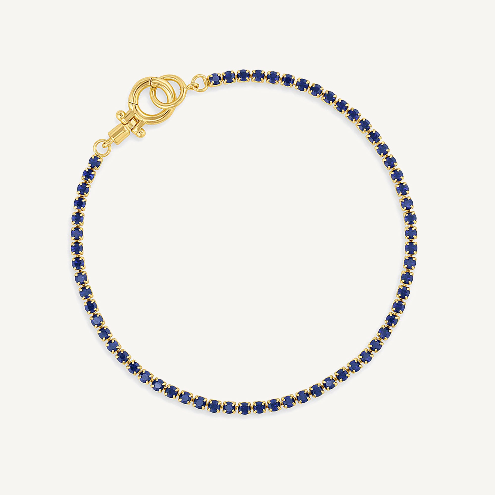 Pulsera tennis lexi circonita azul indigo enchapada en oro 18K de AMBAR joyería fina