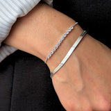 pulsera modelo tennis con cristales y sistema regulable elaborada en plata 925 haciendo un mix con modelo de AMBAR Joyería