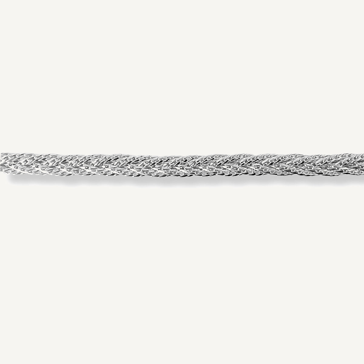 pulsera trenzada con cadenas al detalle que le da un efecto diamantado elaborado en plata 925 para AMBAR joyería