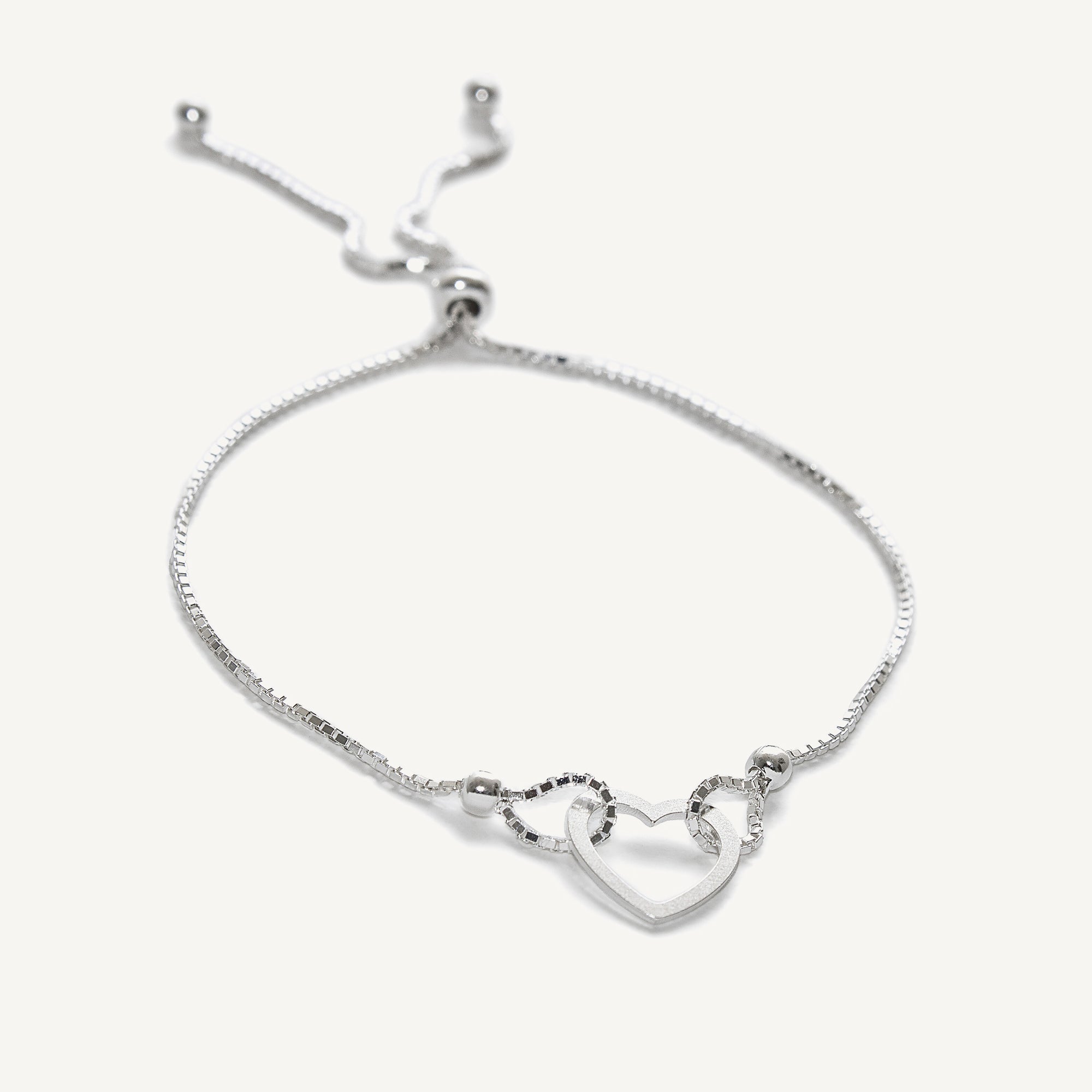 pulsera triana corazón calado con sistema regulable elaborada en plata 925 de AMBAR Joyería Fina