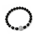 Pulsera elástica para hombre con esferas de piedra natural turmalina negra de 8 mm, hilo de silicona y medalla de San Benito en plata 925.